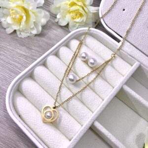 Set perla y coraz�n: Collar con topos